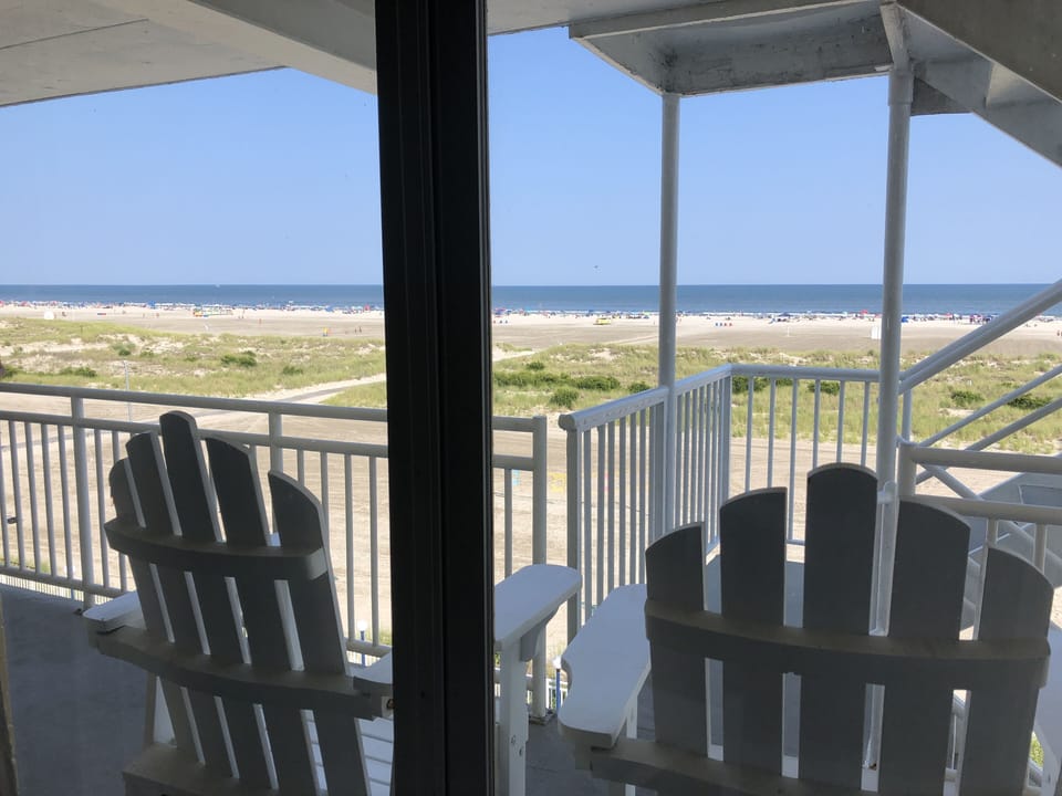 Sit and relax on the balcony overlooking the ocean from 4th-floor.
