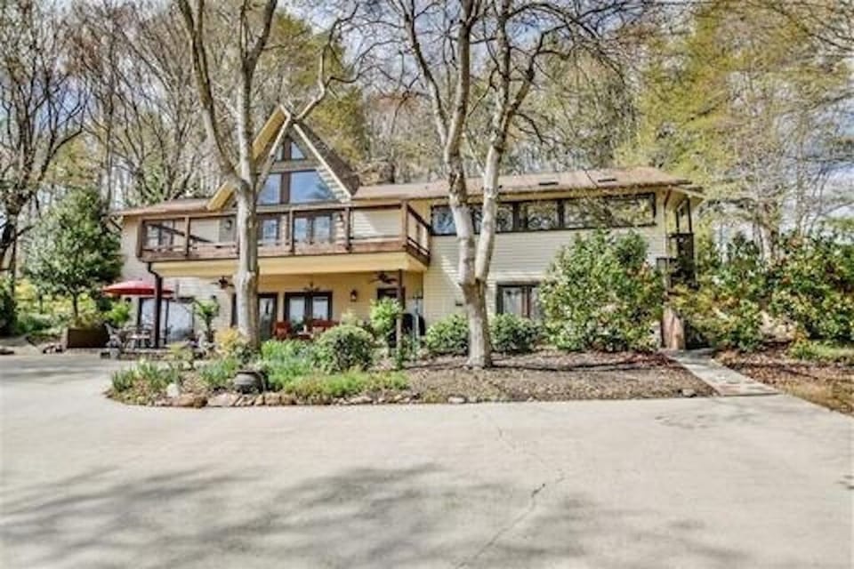Lakeside of home and property. 