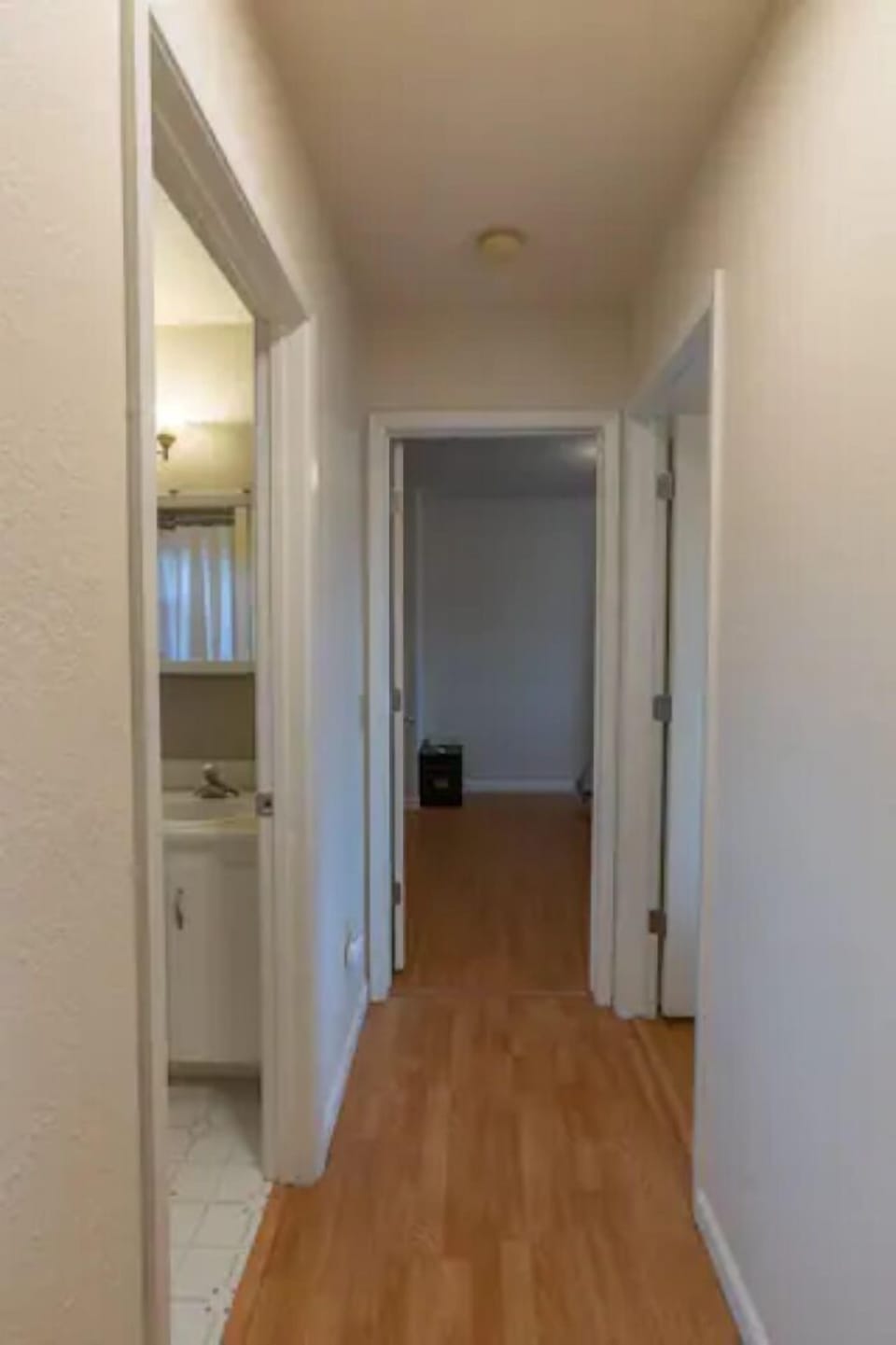 Hallway to upstairs bedrooms and bathroom.