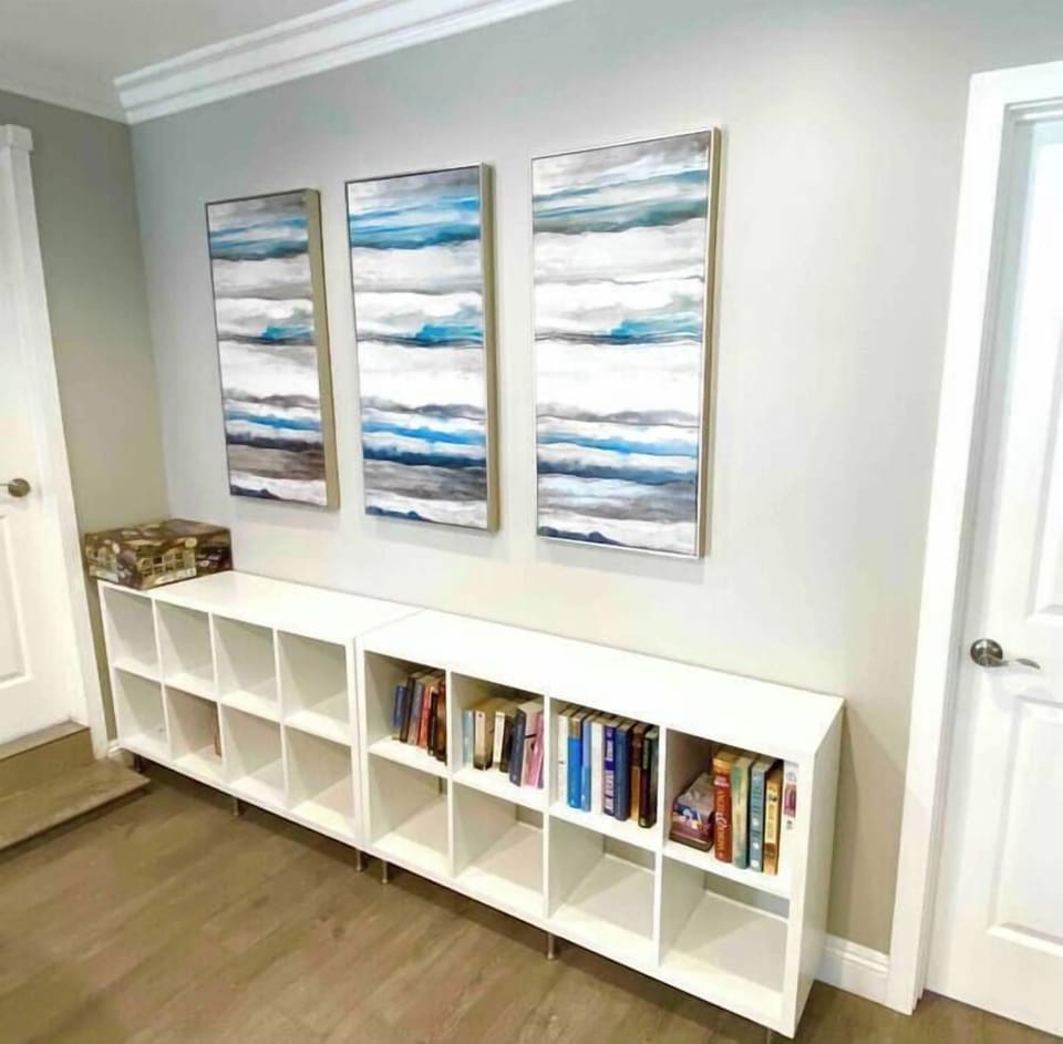 The mini library in the family room.