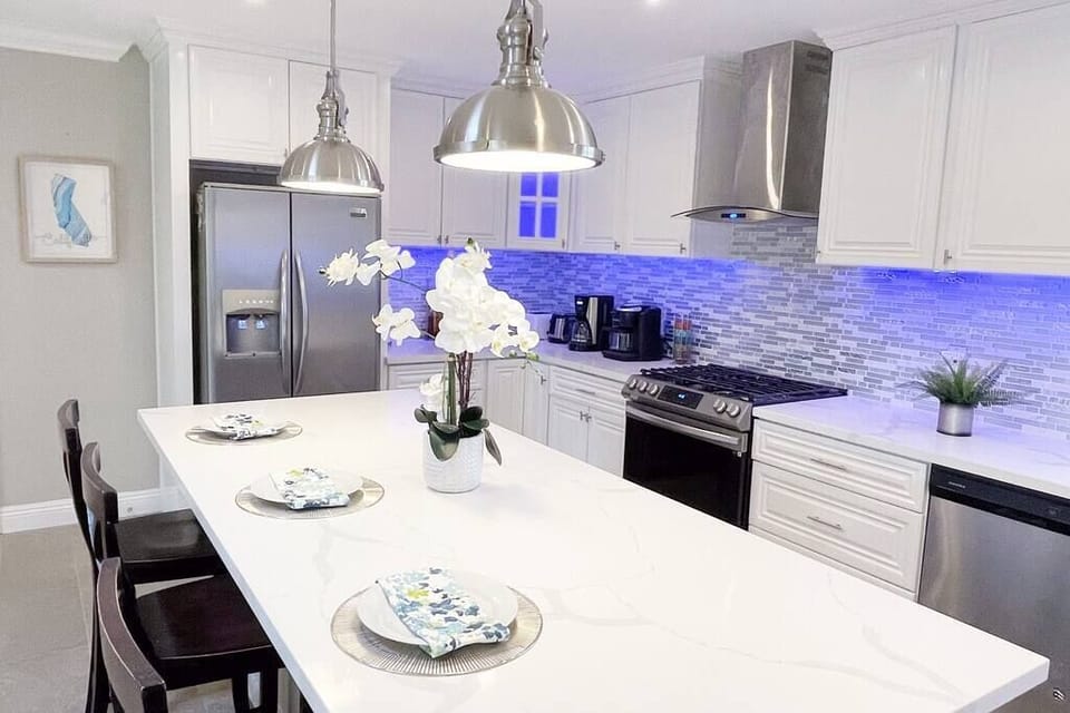 The kitchen is illuminated by motion-activated LED lighting throughout the cabinet for your convenience.