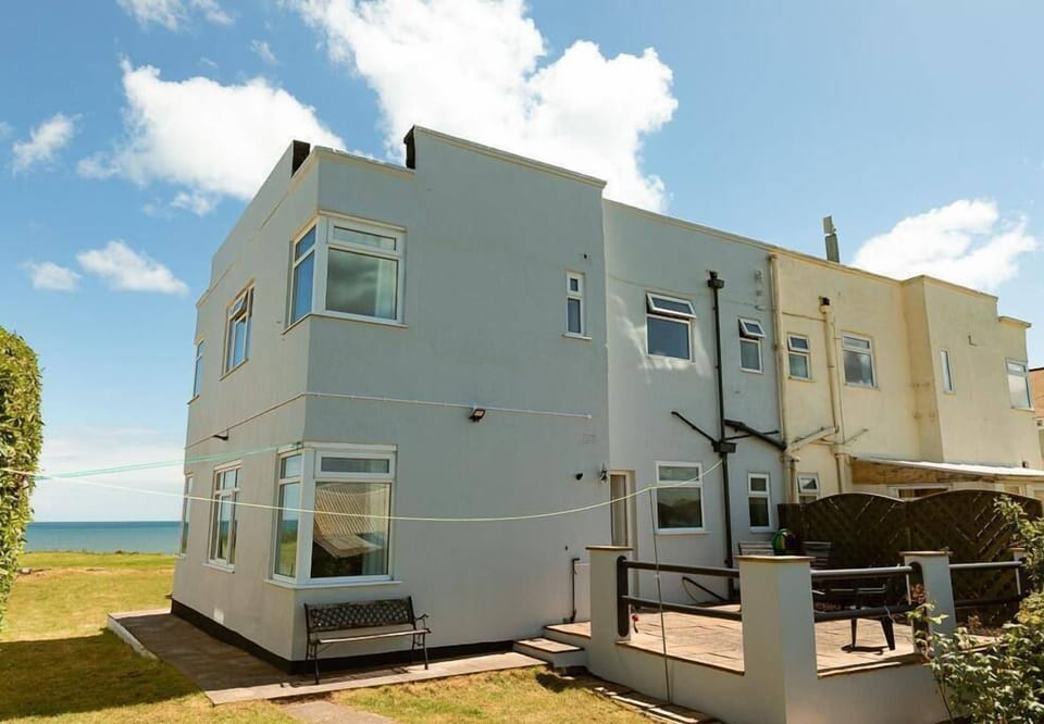 Front of the property, on the edge of the beach front