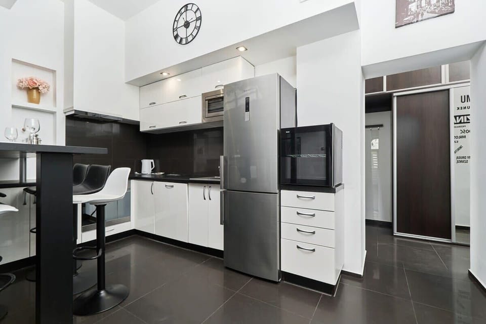 A clean and modern kitchen setup with a focus on simplicity and functionality.