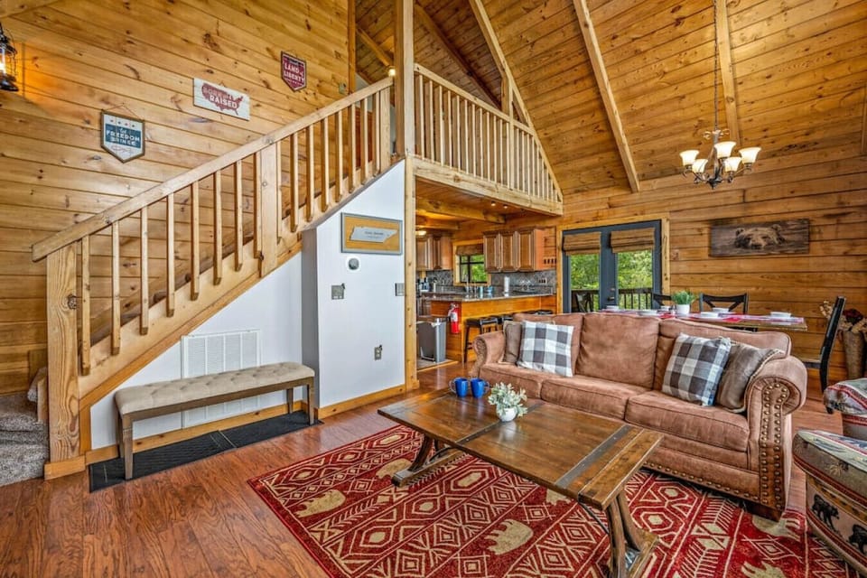 Staircase leading to the open loft area, open floor plan for your family and friends to enjoy.