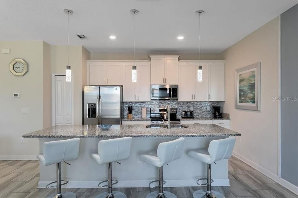 Townhome, 4 Bedrooms | Private kitchen
