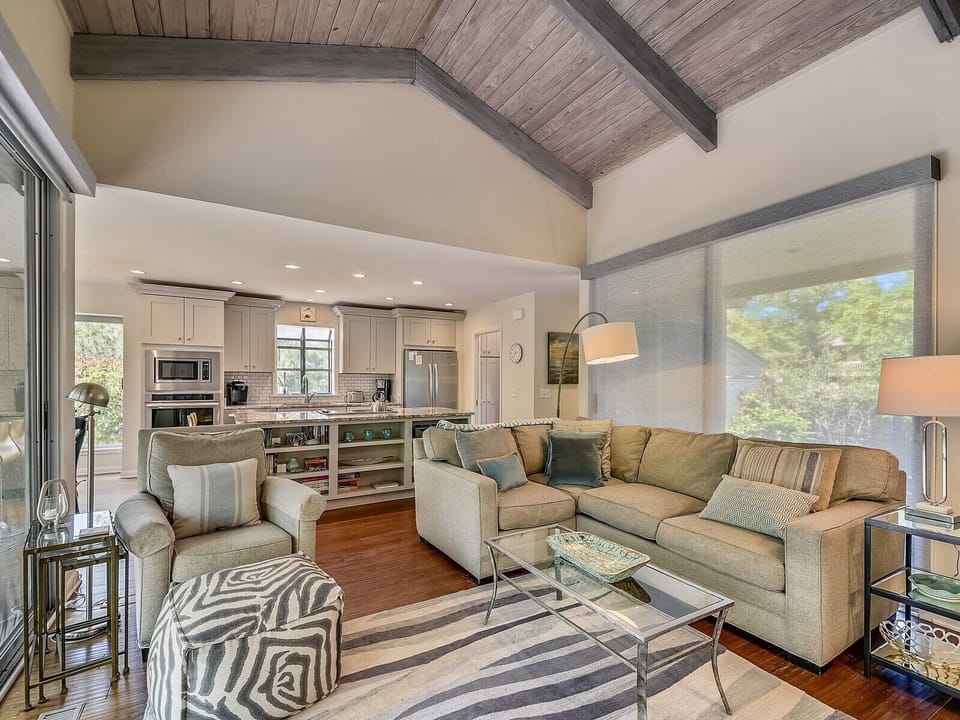 Living Room Opens to Kitchen and Dining Area at 1581 Lagoon Villa