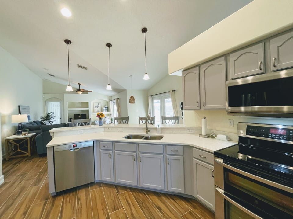 Convection double oven, dishwasher and pool/pond views!
