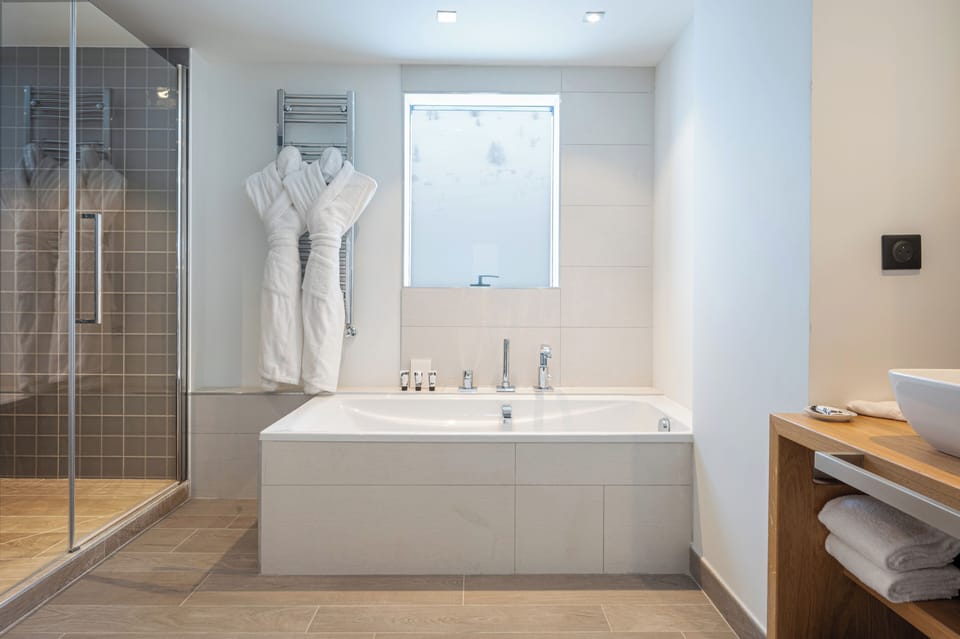 Hair dryer, bathrobes, slippers, towels