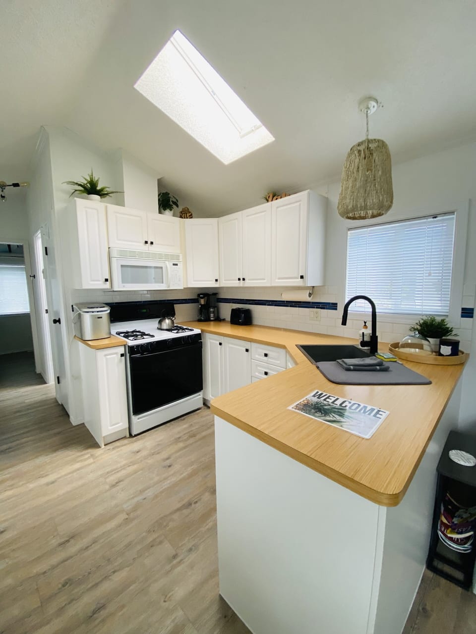 Propane stove/oven in kitchen.