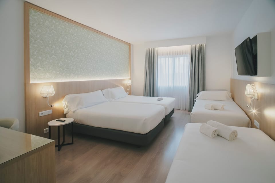 Family Room (2 adults 2 child) | Minibar, in-room safe, desk, soundproofing