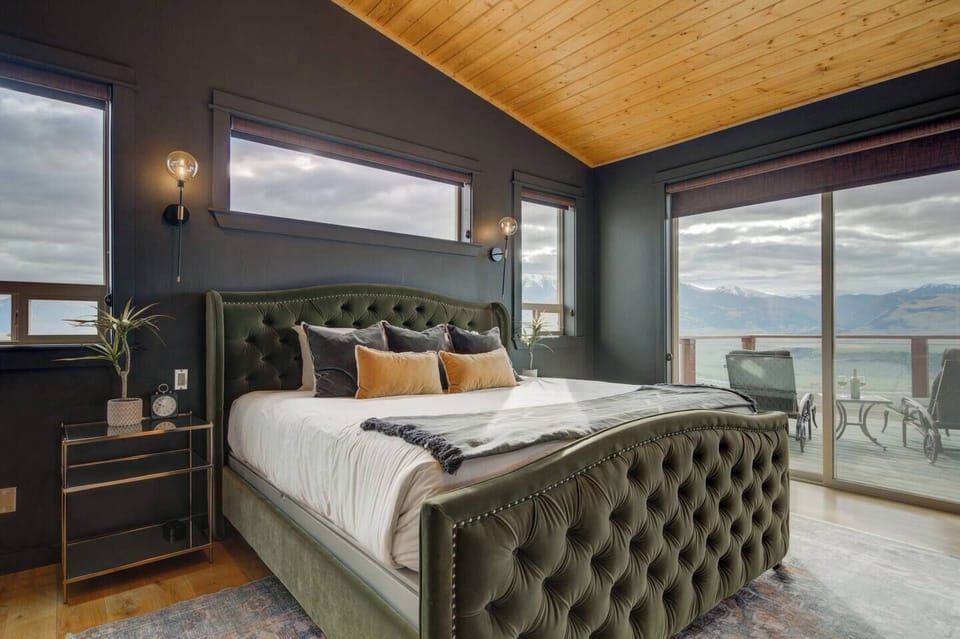 Primary bedroom with stunning views of the Absaroka mountains and Yellowstone River.
