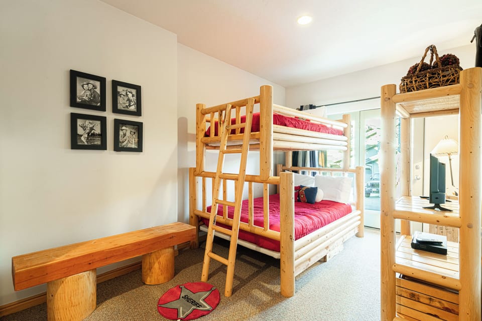 Ground Level Bedroom 3 Bunk Room with twin over full bunkbed, private entrance, 15" Magnavox Tv, and en suite bathroom