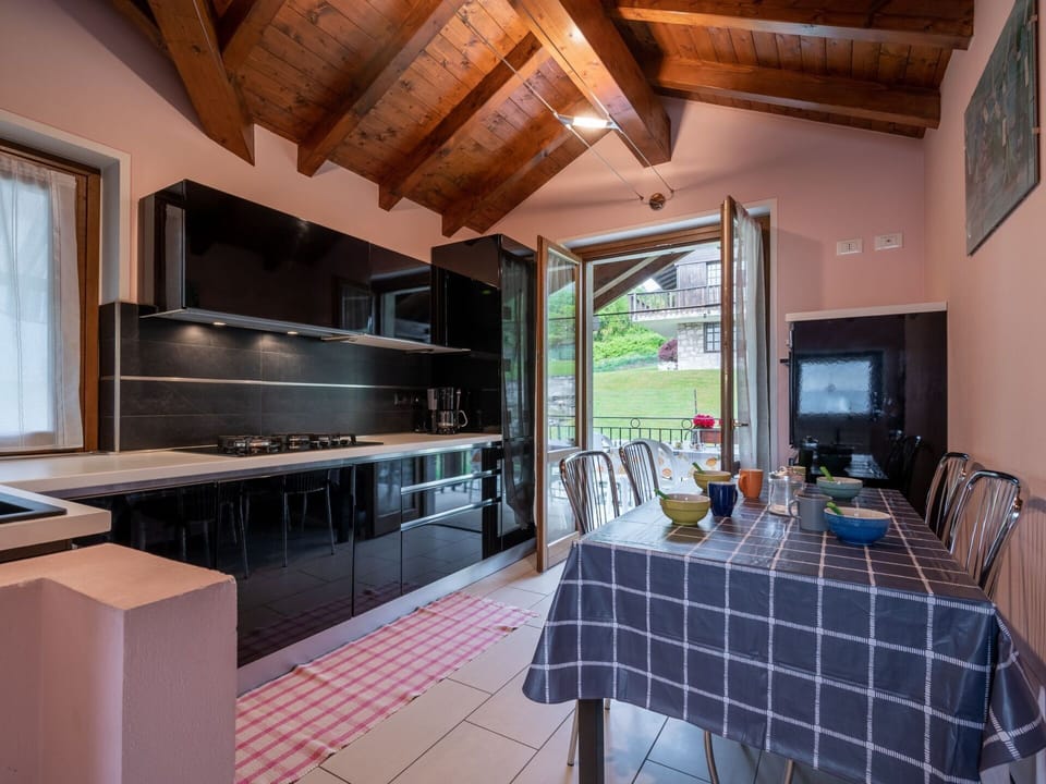 Water, Table, Tableware, Property, Sky, Furniture, Building, Window, Blue, Chair