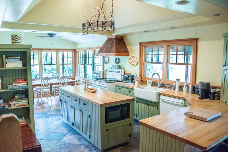 Full kitchen with butcher block counters and island