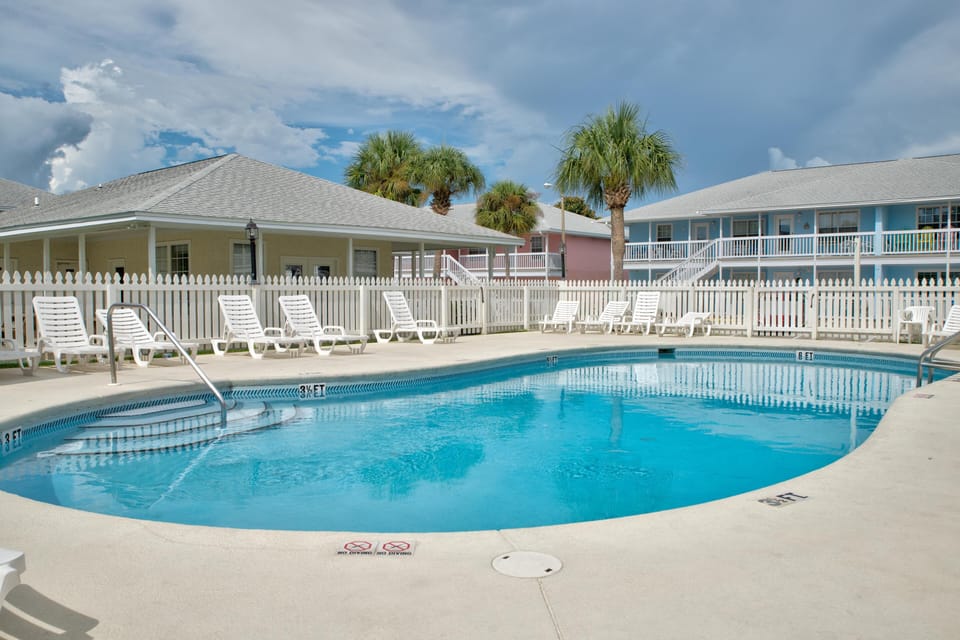 Gorgeous gated community pool with all new furniture
