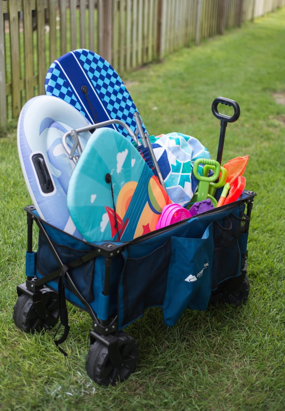 Beach toys and wagon provided. Assortment may vary from photo. 