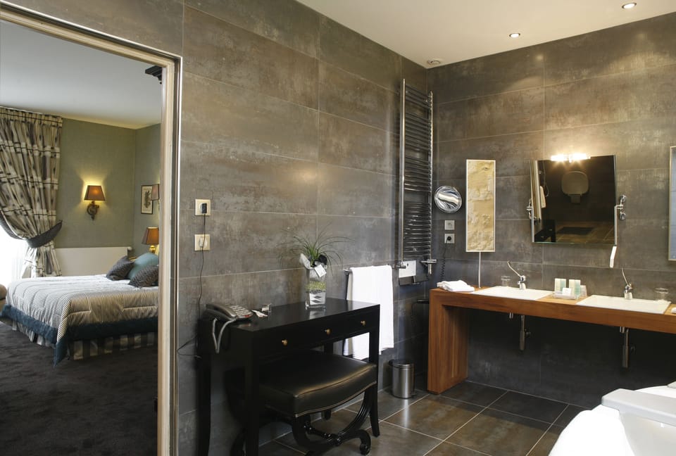 Eco-friendly toiletries, hair dryer, bathrobes, slippers