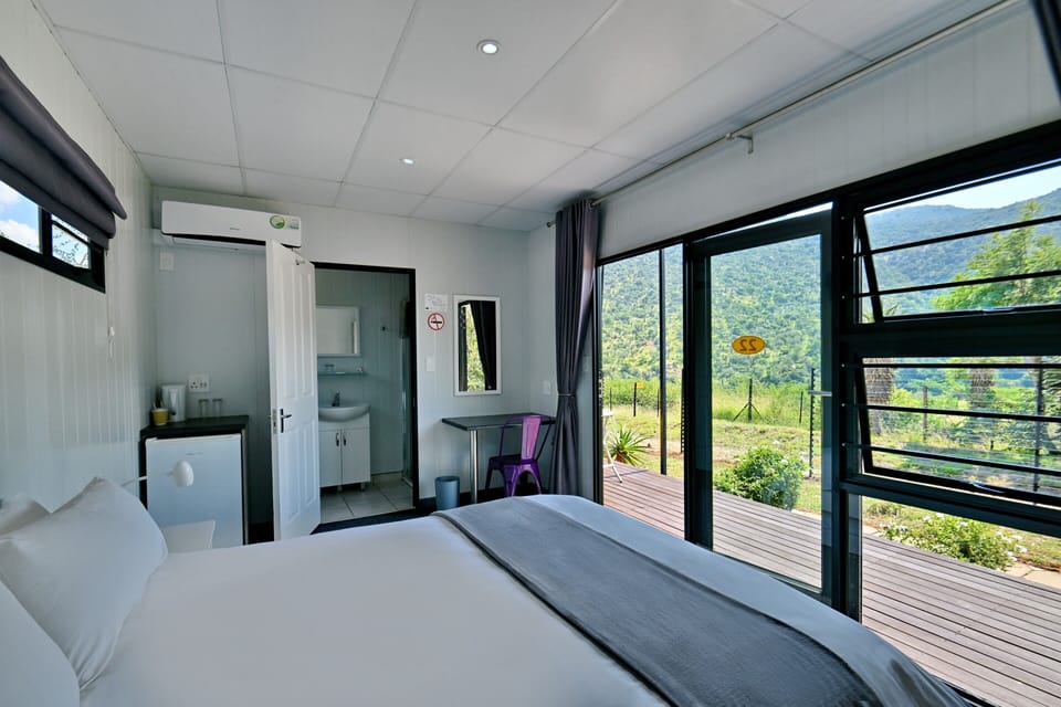Minibar, desk, bed sheets