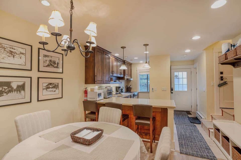 Breakfast Bar looking into Kitchen and Front Entrance
