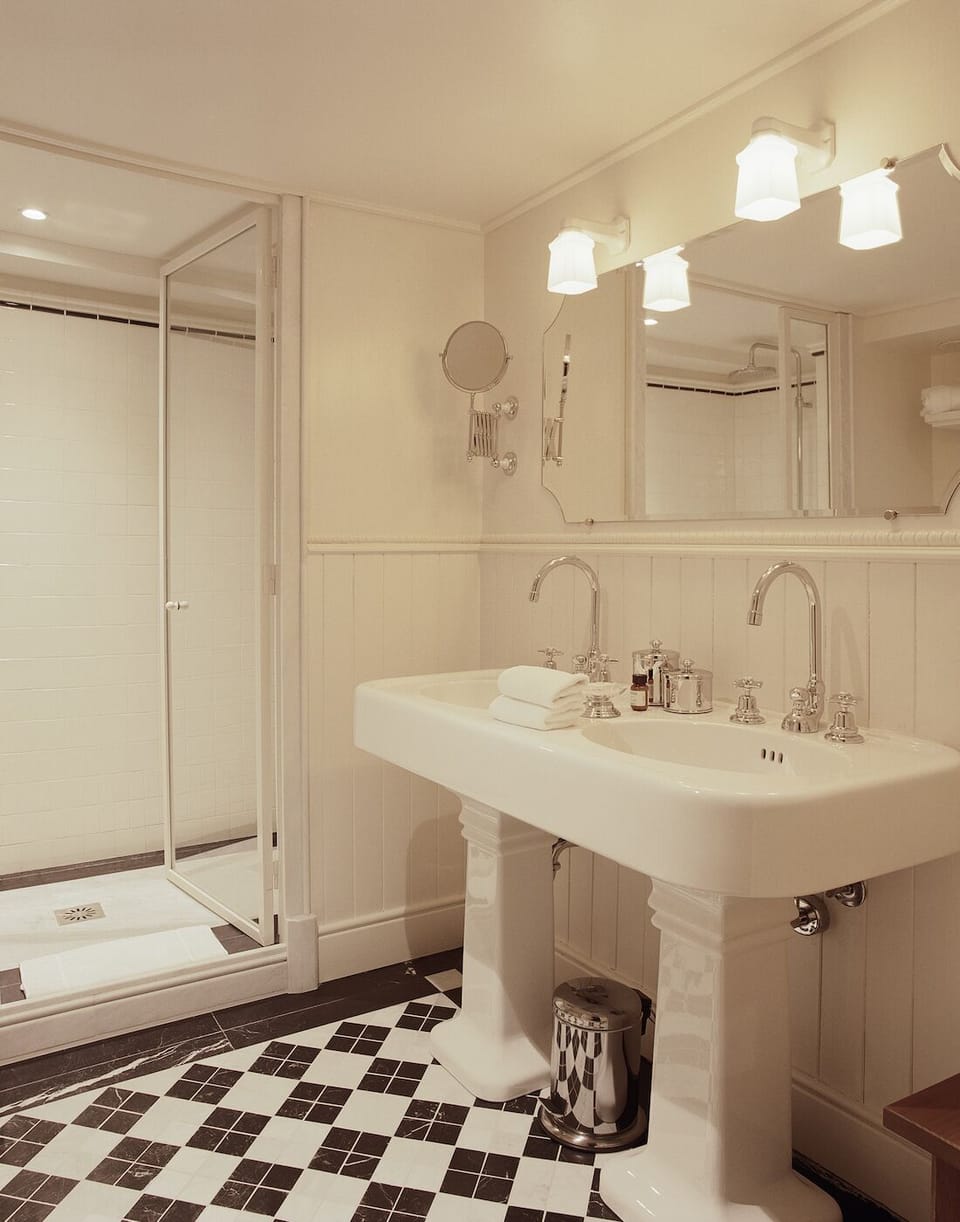 Premier Double Room | Bathroom | Designer toiletries, hair dryer, bathrobes, slippers