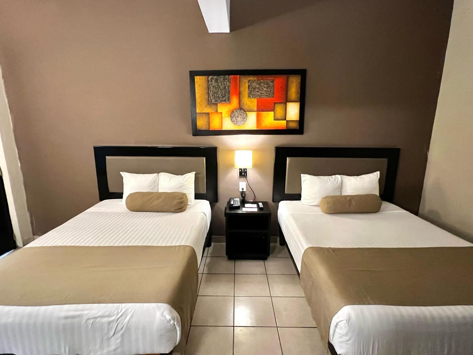 Blackout drapes, iron/ironing board, free WiFi, bed sheets