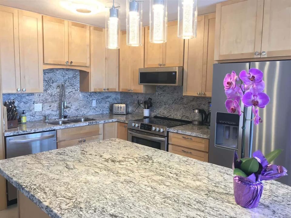 Remodeled kitchen with custom kitchen island
