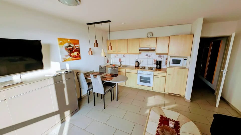 Bright kitchen and dining area for shared meals and games