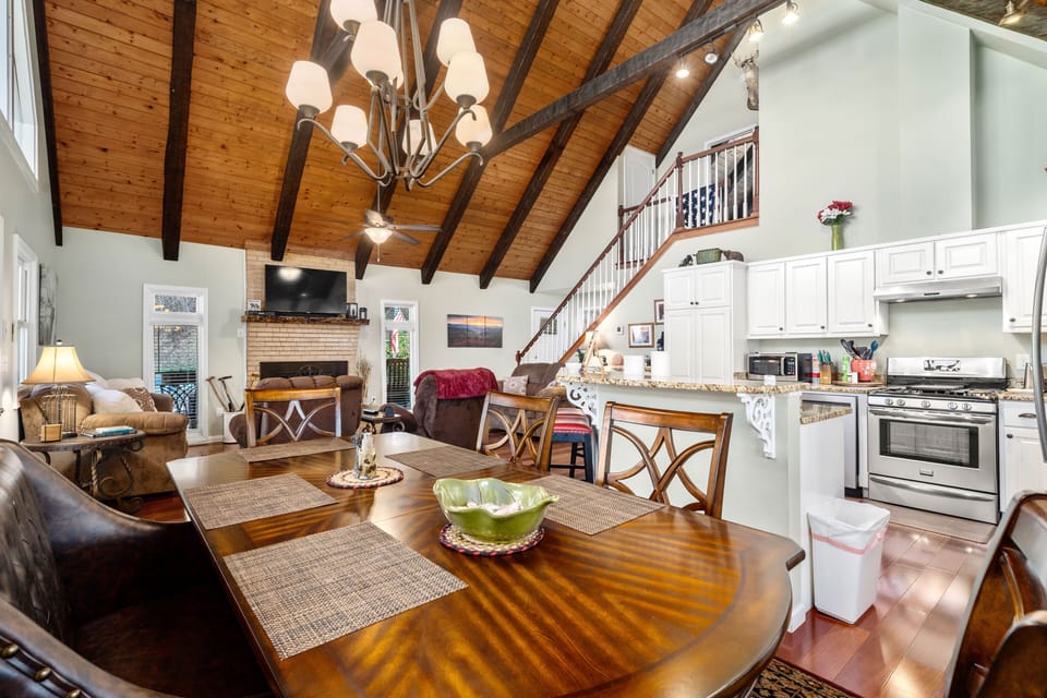 Dining area open to kitchen and living room spaces.