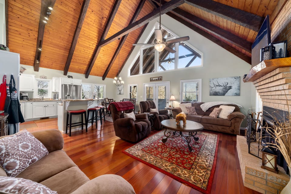 Open concept living room/dining area. Plenty of natural light pours through.