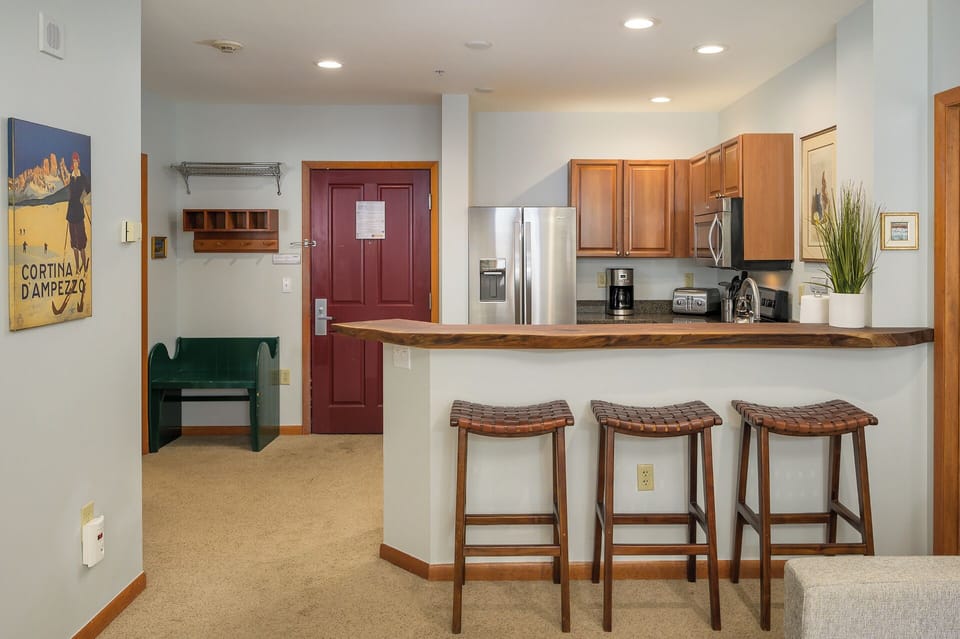 Seating for three at the breakfast bar