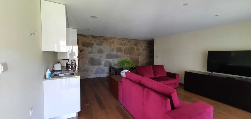 Espaço comum sala de estar, cozinha e sala de jantar