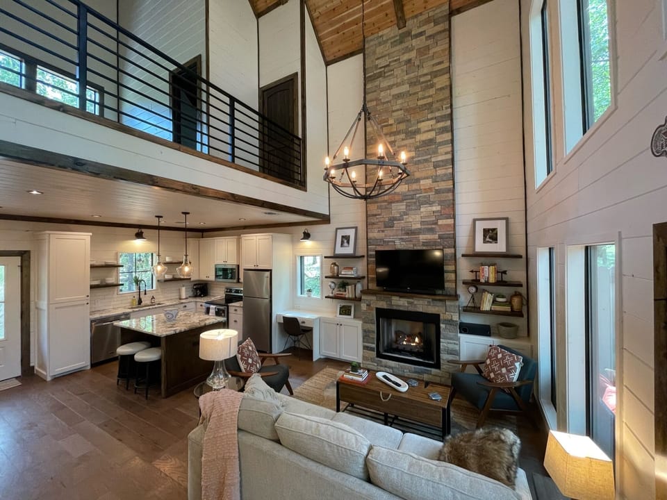 View of the seasonal indoor fireplace.  (active during the fall and winter months)