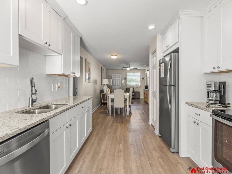 Bright, modern kitchen with sleek appliances and spacious layout