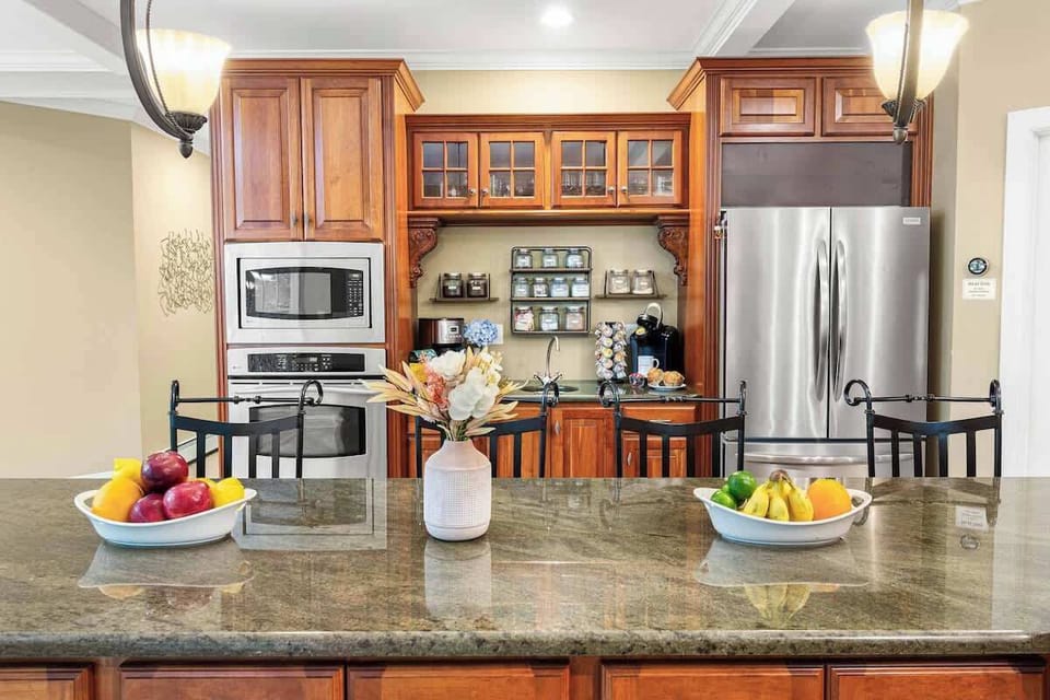 Fully equipped chef's kitchen.  Viking range & stove with 2nd stove available.  Double dishwasher, trash compactor, butchers block countertop, wet bar, granite countertops, & views of the lake!  Kitchenaid mixer, toaster, coffee makers and more.