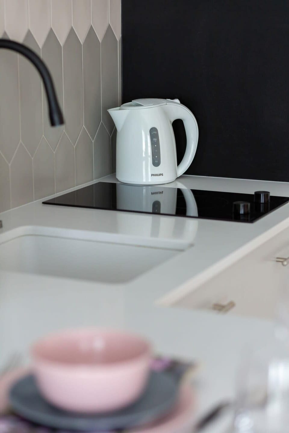 Kitchen equipment - electric kettle and induction hob.