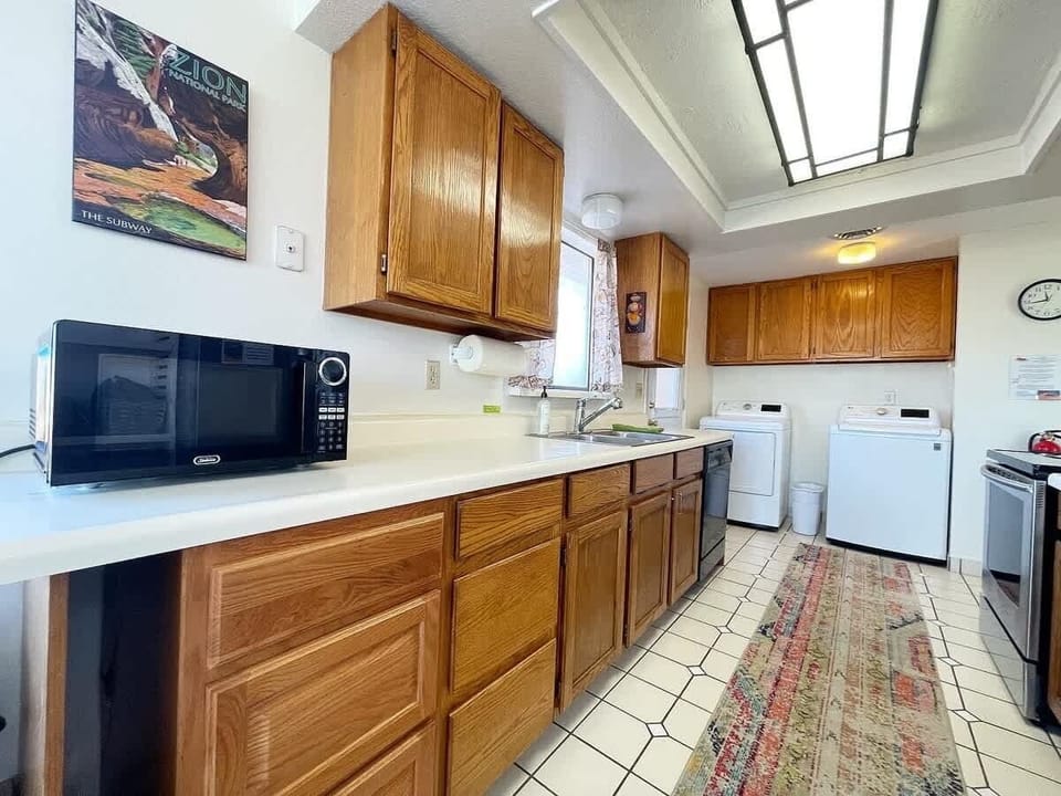 Not only is the kitchen convenient, but the washer and dryer are also right there, with everything you need to keep your clothes clean (we provide the pods and fabric softener).