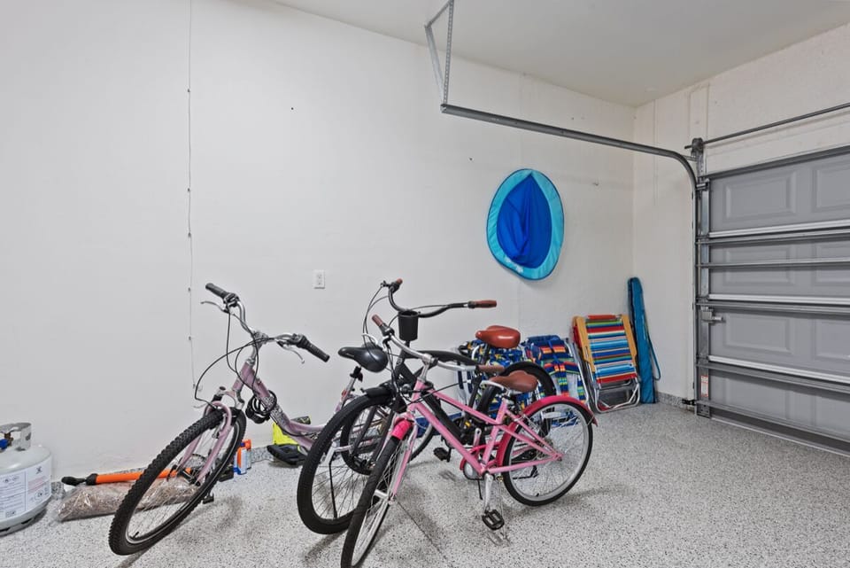 Beach chairs, umbrella, towels and bikes provided