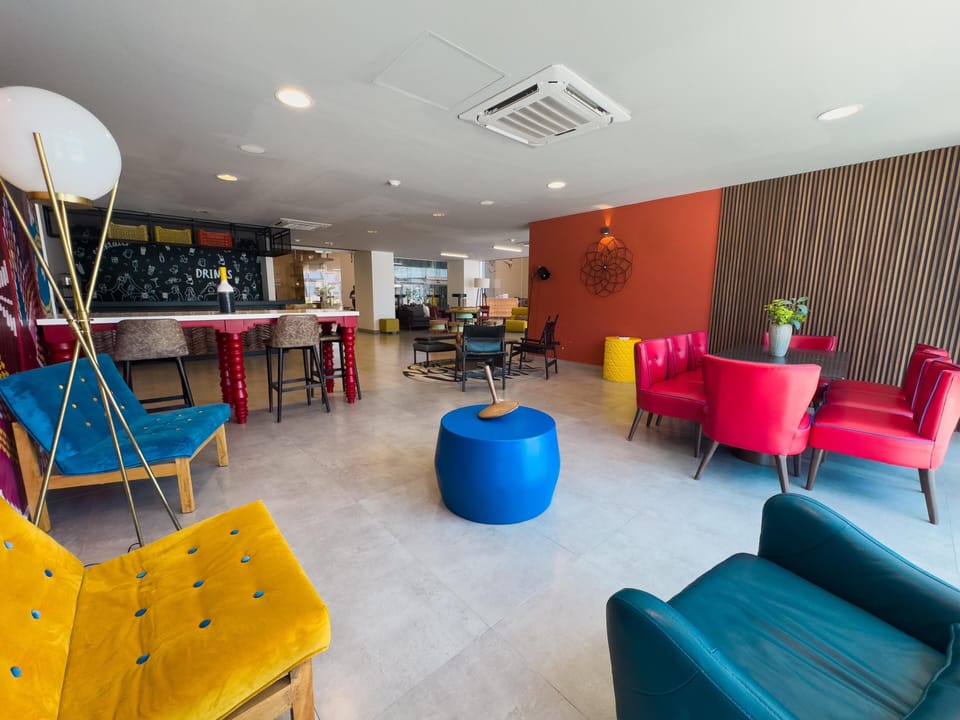 Vibrant lounge with cozy seating and lively atmosphere