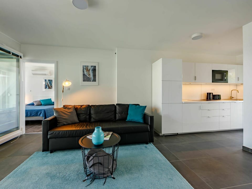 Property, Furniture, Comfort, Azure, Couch, Wood, Interior Design, Lighting, Picture Frame, Building