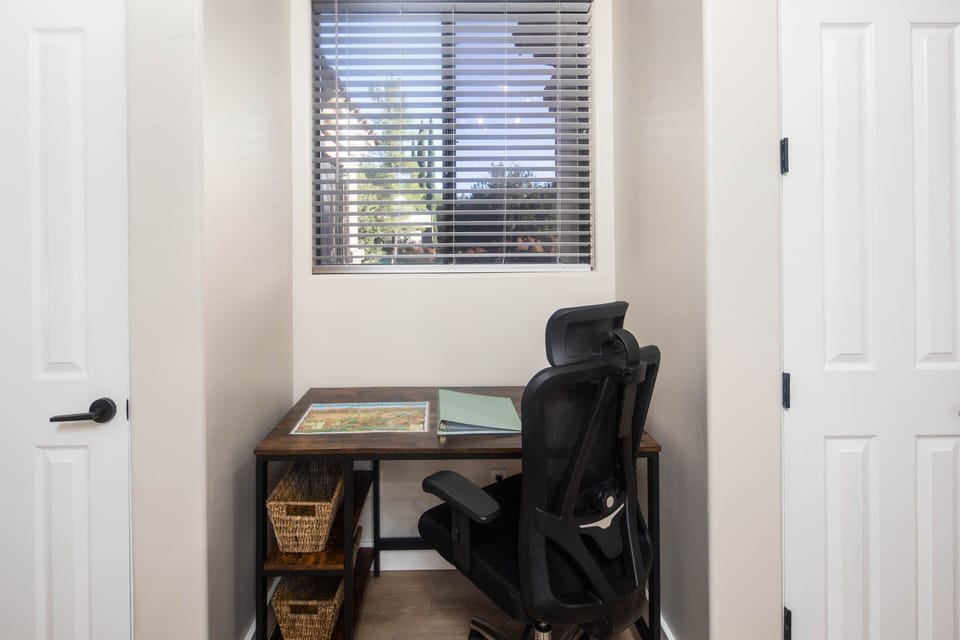 Office nook in the main room provides a workspace for guests. 