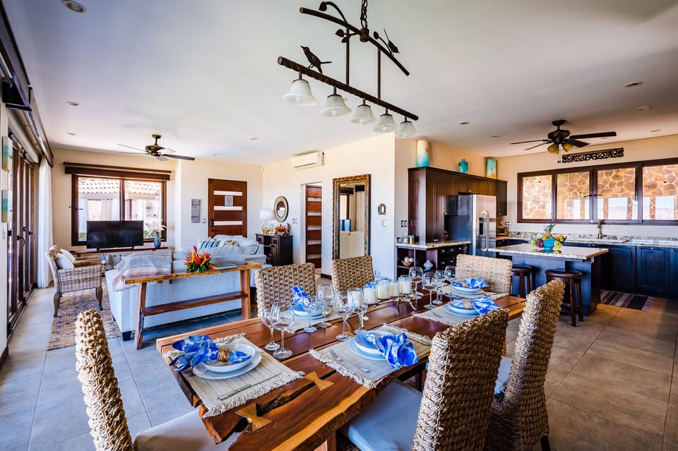 Dining area to living room and kitchen.