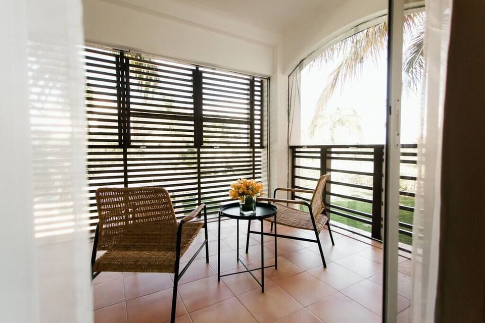 View from living room of adjoining terrace with mosquito netting