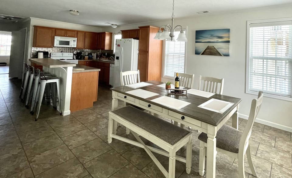 Room for eating at the dining room table or kitchen island.