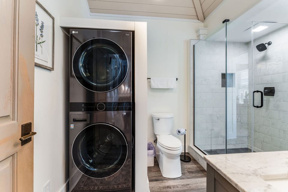 1st floor bathroom with walk-in shower, and laundry