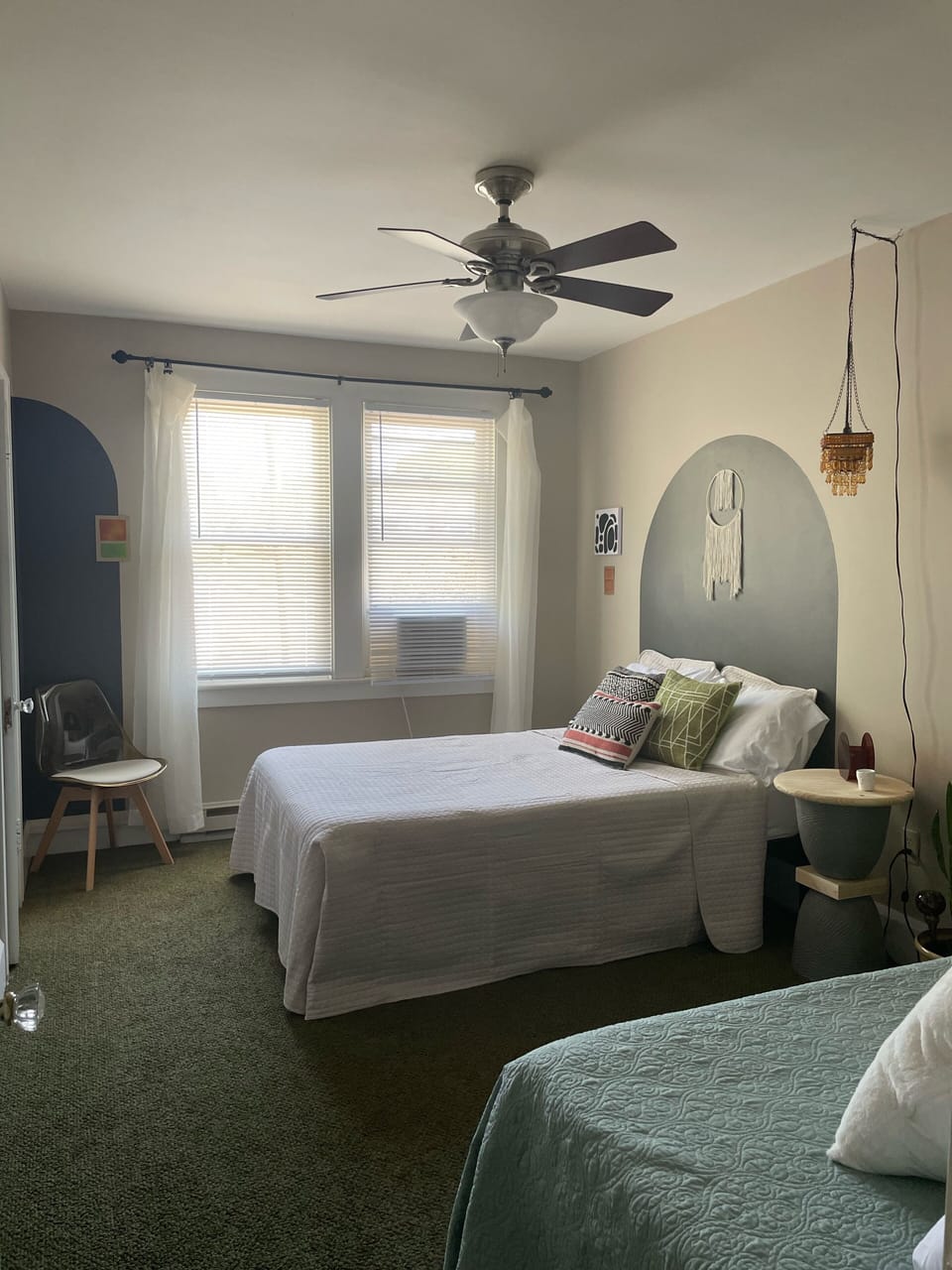 Bedroom with 1 full and 1 single bed.  