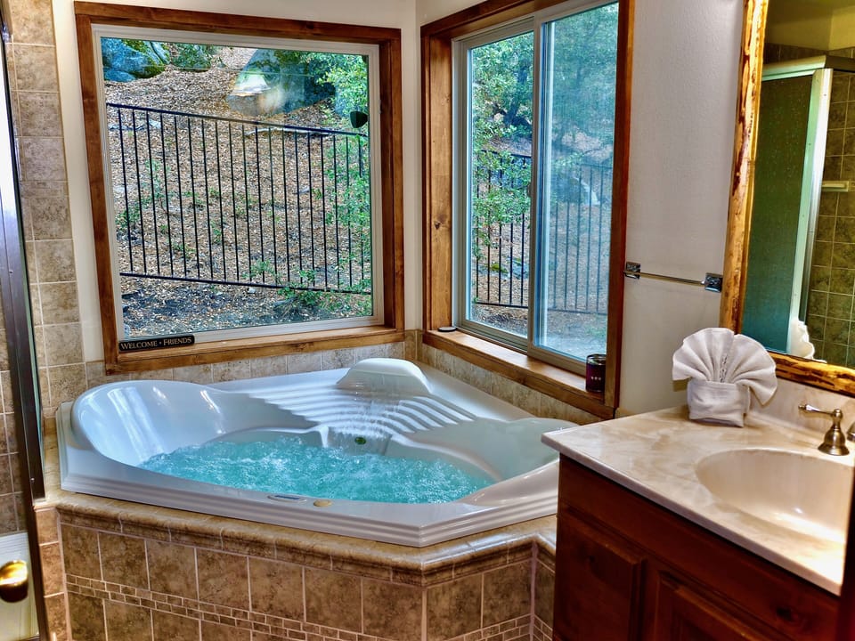 Private jetted tub in the en suite bath