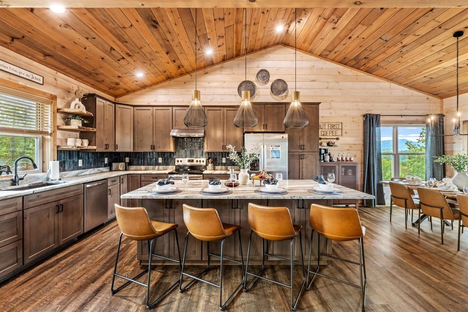 Granite countertops and stainless steel — your dream mountain kitchen.