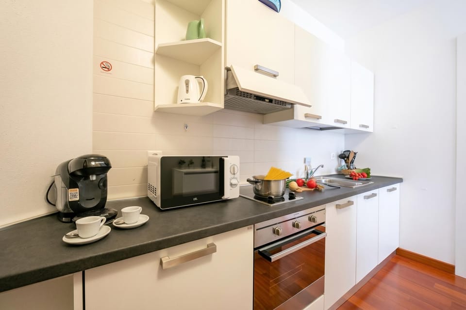 Standard Studio, Balcony (Moonlight - 150m from the lake) | Private kitchen | Stovetop, dining tables