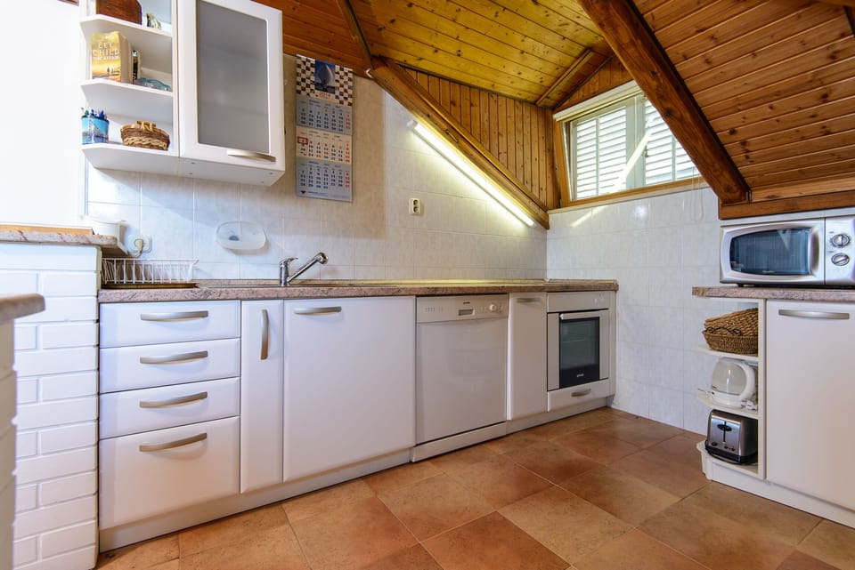 Apartment | Private kitchen | Fridge, microwave, oven, stovetop