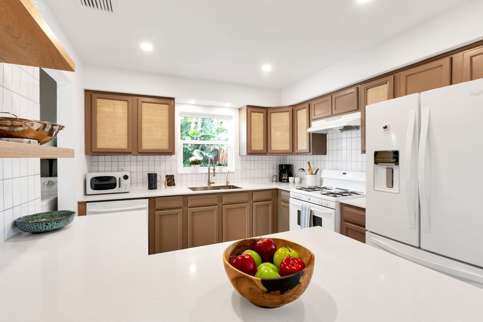 Kitchen has a gas stove and is well stocked 